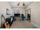 Bright bedroom with ceiling fan and large window perfect for an office space at 1161 S Marshall St, Lakewood, CO 80232