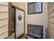 Welcoming front door with decorative wreath and covered entrance at 1161 S Marshall St, Lakewood, CO 80232