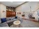 Spacious living room with a custom built-in storage and natural light at 1161 S Marshall St, Lakewood, CO 80232