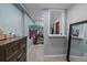 Bright walk-in closet featuring ample storage and custom shelving for organization and style at 1161 S Marshall St, Lakewood, CO 80232