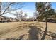 Extensive lawn with trees, providing a peaceful and natural setting for residents at 1161 S Marshall St, Lakewood, CO 80232