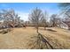 Expansive lawn with mature trees and scenic views surrounding the property at 1161 S Marshall St, Lakewood, CO 80232