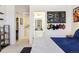 This bedroom features sport-themed decor and access to the bathroom at 4736 S Buchanan St, Aurora, CO 80016