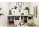 Dog kennels feature white cabinets and sliding barn doors at 4736 S Buchanan St, Aurora, CO 80016