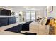 Spacious main bedroom with tray ceiling, plants, and ample natural light at 4736 S Buchanan St, Aurora, CO 80016