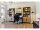 Bright office space with built-in shelving and a comfortable workspace at 4736 S Buchanan St, Aurora, CO 80016