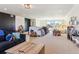 Well-lit playroom with large windows, lots of games, and a comfortable seating area at 4736 S Buchanan St, Aurora, CO 80016