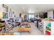 Spacious play room with ample storage, playful decor, and plenty of room for fun and games at 4736 S Buchanan St, Aurora, CO 80016