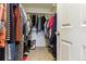 Walk-in closet with ample storage space for clothes and shoes at 4736 S Buchanan St, Aurora, CO 80016