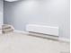 Finished basement featuring neutral carpet, floating storage cabinet, and recessed lighting at 10065 Martin Luther King Blvd, Denver, CO 80238