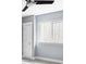 Bedroom featuring a small window to an egress and a standard closet door at 10065 Martin Luther King Blvd, Denver, CO 80238