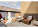Back patio area with modern outdoor furniture and partial fencing at 10065 Martin Luther King Blvd, Denver, CO 80238
