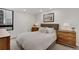 Cozy bedroom features bright natural light and clean neutral decor at 1020 15Th St # 31E, Denver, CO 80202