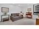 Sunlit living room boasting chic decor and a comfortable seating arrangement at 1020 15Th St # 31E, Denver, CO 80202