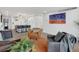 Bright living area featuring a modern kitchen, stylish furnishings, and contemporary decor at 1020 15Th St # 31E, Denver, CO 80202