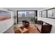 Stylish living area with balcony, comfortable seating, and stunning city views at 1020 15Th St # 31E, Denver, CO 80202