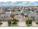 Real estate aerial view shows a neighborhood featuring a well-maintained home at 646 Gamble Oak St, Brighton, CO 80601