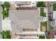 Aerial view of the property showcasing the roof, landscaping, and surrounding neighborhood at 646 Gamble Oak St, Brighton, CO 80601