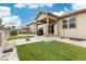 Inviting backyard with green lawn, patio, storage shed, and gravel landscaping at 646 Gamble Oak St, Brighton, CO 80601