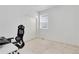 Room showing desk and a closet with carpet flooring and large windows at 646 Gamble Oak St, Brighton, CO 80601