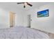 Bedroom with a ceiling fan and television at 646 Gamble Oak St, Brighton, CO 80601
