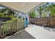 Backyard patio with seating, a small yard, and partial shade perfect for outdoor living at 14582 E Harvard Ave, Aurora, CO 80014