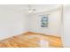 Bright bedroom features hardwood floors and window at 14582 E Harvard Ave, Aurora, CO 80014