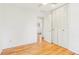 Bright bedroom features hardwood floors and closet at 14582 E Harvard Ave, Aurora, CO 80014