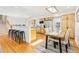 Modern kitchen featuring stainless steel appliances, ample cabinet space, and a breakfast bar at 14582 E Harvard Ave, Aurora, CO 80014