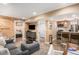 Open basement with a living area and kitchenette, perfect for entertaining at 1419 N Adams St, Denver, CO 80206