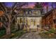 Charming two-story home with a well-manicured lawn and walkway leading to the front entrance at 1419 N Adams St, Denver, CO 80206