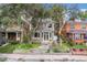 Charming two-story home with well-maintained landscaping and inviting front entrance at 1419 N Adams St, Denver, CO 80206