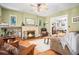 Cozy living room with fireplace, hardwood floors, and natural light at 1419 N Adams St, Denver, CO 80206