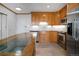 Bright kitchen equipped with stainless steel appliances, ample cabinetry, and custom kitchen island at 3100 E Cherry Creek South Dr # 1507, Denver, CO 80209
