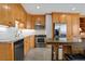 Charming kitchen with stainless steel appliances and custom wood cabinetry at 3100 E Cherry Creek South Dr # 1507, Denver, CO 80209