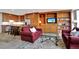 Open concept living space with a well-equipped kitchen, custom built-ins, and comfortable seating, creating a welcoming atmosphere at 3100 E Cherry Creek South Dr # 1507, Denver, CO 80209