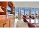 Bright and airy living room with floor-to-ceiling windows and comfortable seating at 3100 E Cherry Creek South Dr # 1507, Denver, CO 80209