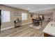Dining area filled with sunlight boasting modern flooring and a contemporary dining set at 24621 E Berry Pl, Aurora, CO 80016