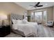 Serene main bedroom with a large bed, a bay window, and plenty of space at 24621 E Berry Pl, Aurora, CO 80016