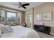 Tranquil main bedroom with a bay window, soft lighting, and a cozy seating area at 24621 E Berry Pl, Aurora, CO 80016