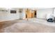 Spacious finished basement offering versatile layout options and access to various rooms at 29263 Sue Rd, Evergreen, CO 80439