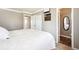 Bright bedroom with a large closet space and en-suite bathroom at 29263 Sue Rd, Evergreen, CO 80439