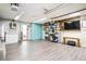 Well-organized garage featuring ample storage, shelving, and workspace with epoxy floors, ideal for projects and organization at 29263 Sue Rd, Evergreen, CO 80439