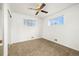 Bright bedroom with neutral carpet and ceiling fan at 11040 Emerson St, Northglenn, CO 80233