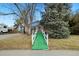 House with a ramp and a green pathway leading to the entrance at 11040 Emerson St, Northglenn, CO 80233