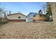 View of the back exterior of the house at 11040 Emerson St, Northglenn, CO 80233