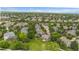 Aerial view of home in quiet neighborhood, surrounded by mature trees and well-manicured lawns at 3237 W 113Th Ave, Westminster, CO 80031