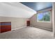 Bedroom features a blue-painted vaulted ceiling, carpeted floor, natural light, and uniquely styled alcove shelves at 3237 W 113Th Ave, Westminster, CO 80031