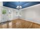 Charming dining room with hardwood floors, a modern chandelier, and patio access at 3237 W 113Th Ave, Westminster, CO 80031