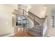 Inviting foyer showcasing hardwood floors, staircase, and views into the living room at 3237 W 113Th Ave, Westminster, CO 80031